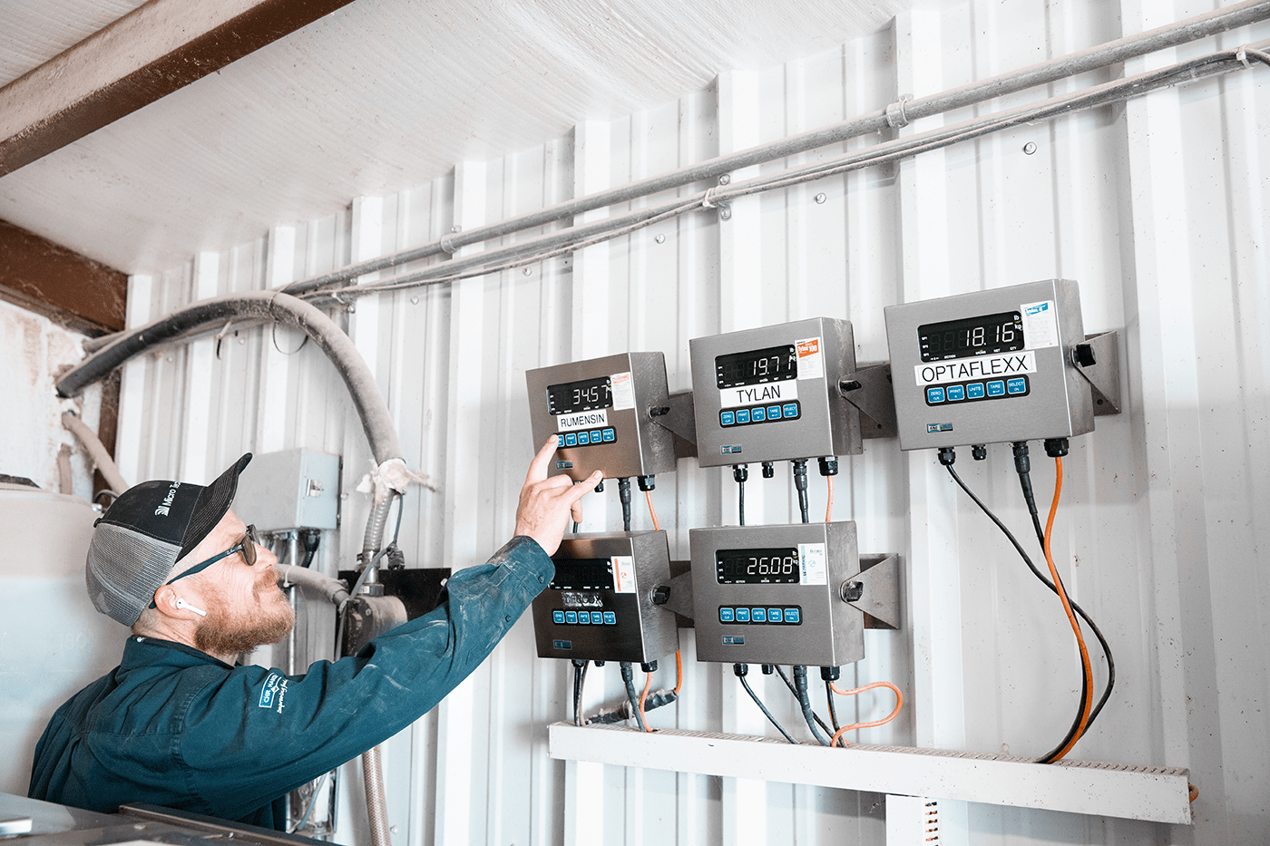 Man checking equipment used by Micro Technologies